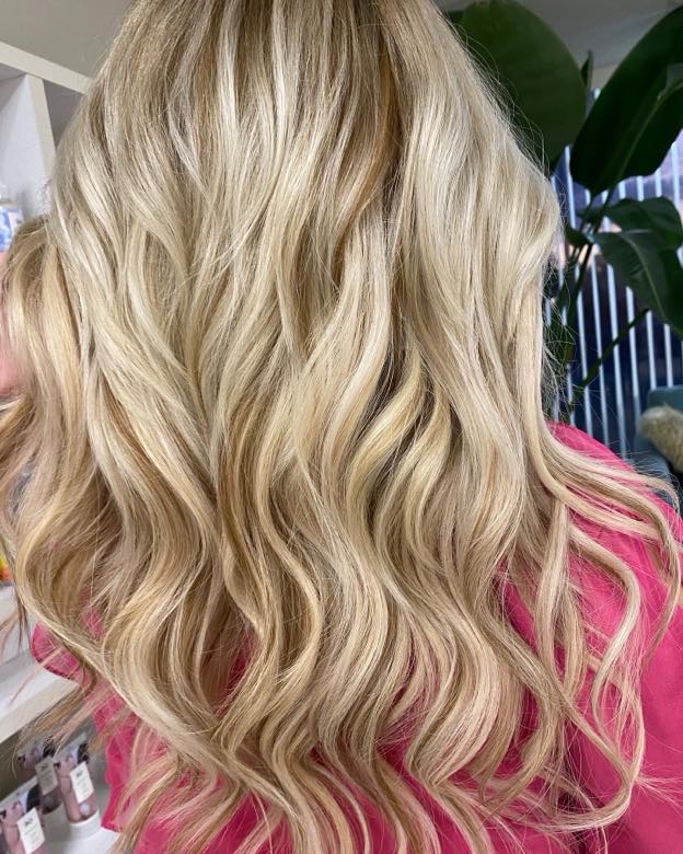 Blonde beach waves styled at the salon